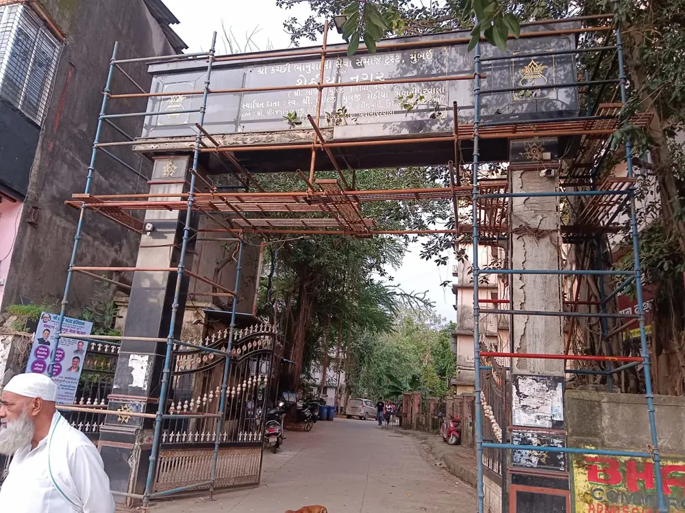 Scaffolding framework installed above an entrance in Mumbai